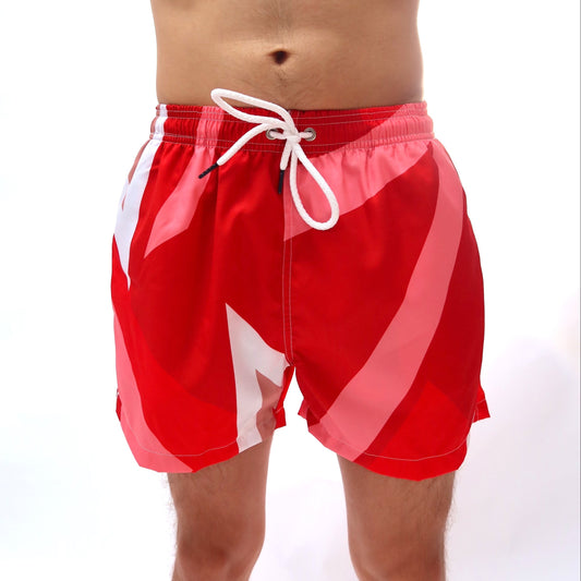 Red swim shorts with white drawstring on a white background